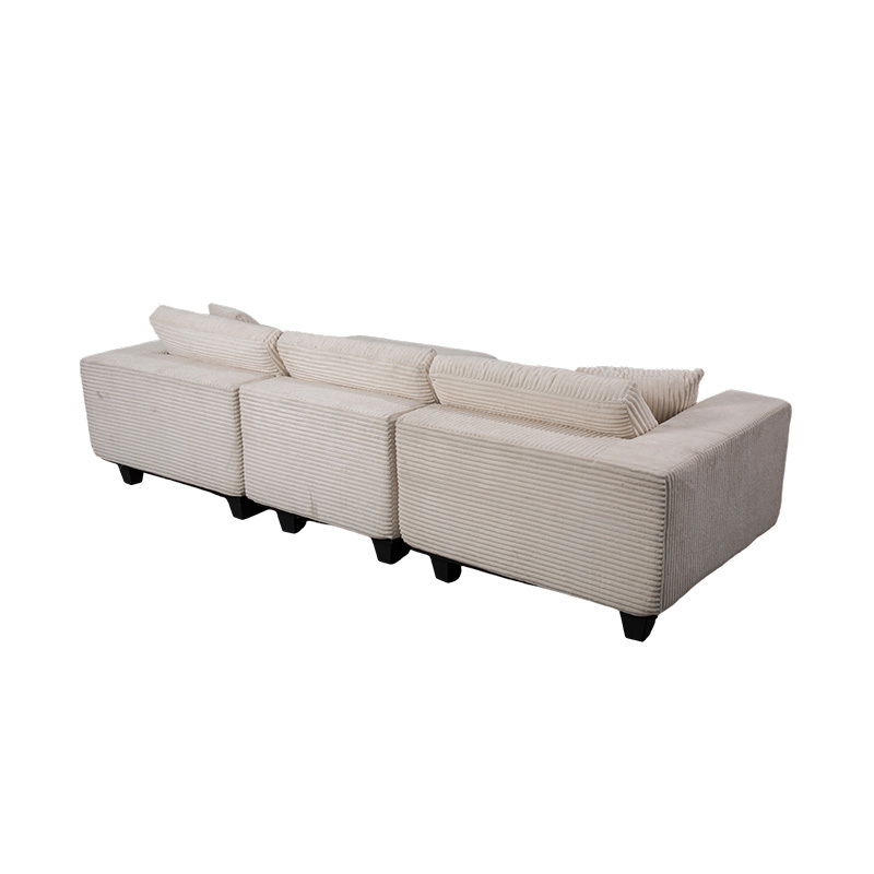 Großes L-förmiges Ecksofa aus cremefarbenem Cord mit modernem, minimalistischem Design Großes L-förmiges Ecksofa aus cremefarbenem Cord mit modernem, minimalistischem Design