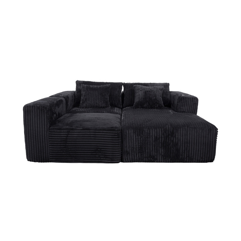 Großes L-förmiges Ecksofa aus schwarzem Cord mit Vollschaummodulen, mehreren Kissen und integrierten Getränkehaltern Großes L-förmiges Ecksofa aus schwarzem Cord mit Vollschaummodulen, mehreren Kissen und integrierten Getränkehaltern