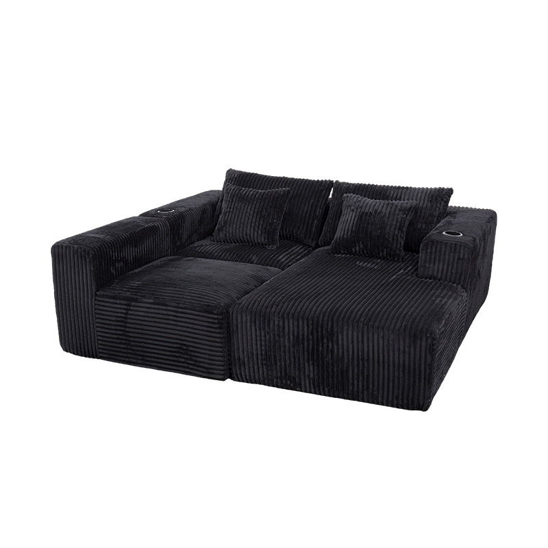 Großes L-förmiges Ecksofa aus schwarzem Cord mit Vollschaummodulen, mehreren Kissen und integrierten Getränkehaltern Großes L-förmiges Ecksofa aus schwarzem Cord mit Vollschaummodulen, mehreren Kissen und integrierten Getränkehaltern